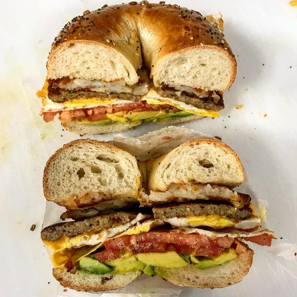 Bagel with Sausage, Egg, Cheese, Tomato & Avocado.